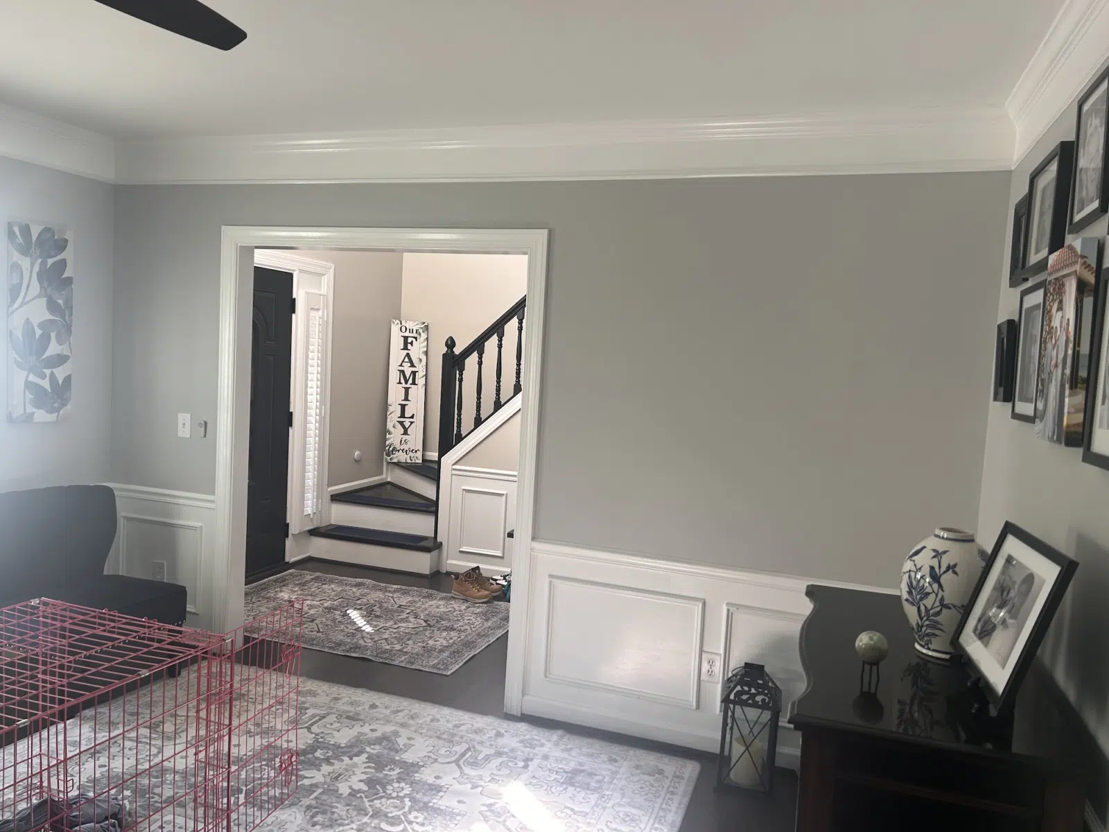 Living room with gray walls and white wainscoting — Father And Son Custom Painting in Raleigh
